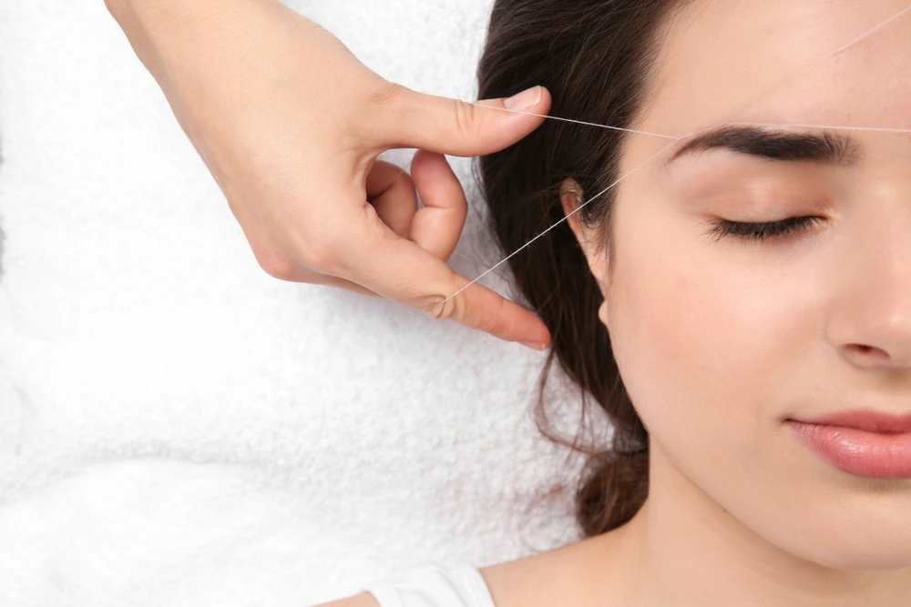 The Ultimate Guide to Tweezing, Threading, and Waxing Eyebrows
