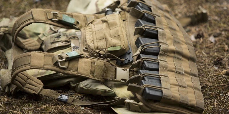 How to secure equipment to the nylon straps on a tactical vest?