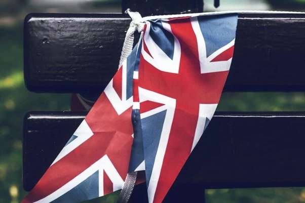 What is the penalty for overstaying in the UK?
