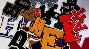 How to apply embroidered patches to hats or garments?