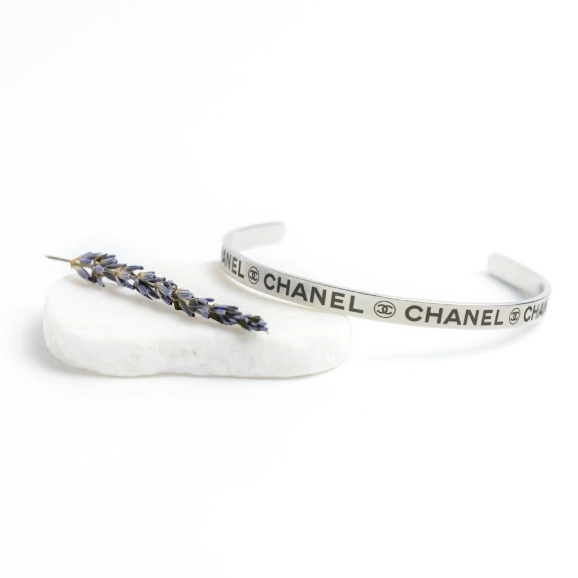 Elegance Unveiled: The Allure of the Silver Chanel Bracelet