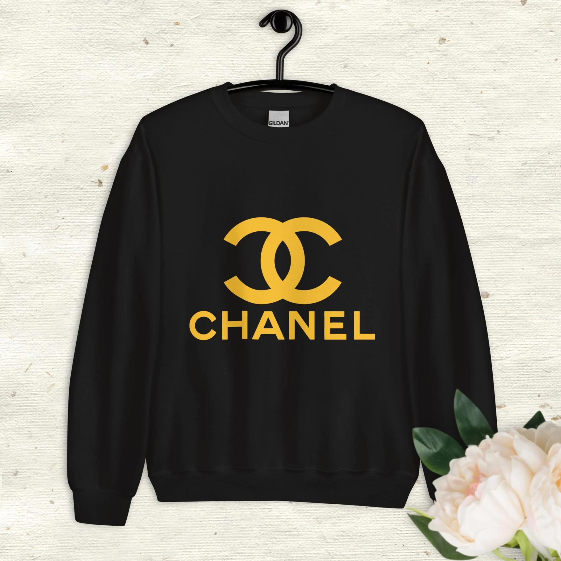 Cozy in Chanel: Unraveling the Allure of the Ultimate Fashion Statement Sweater