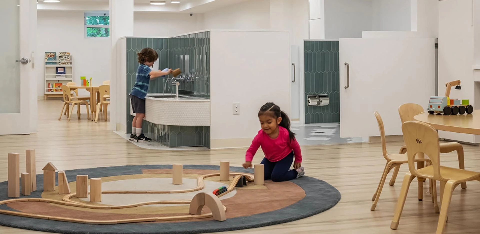 How does preschool education support a child's social and emotional development?