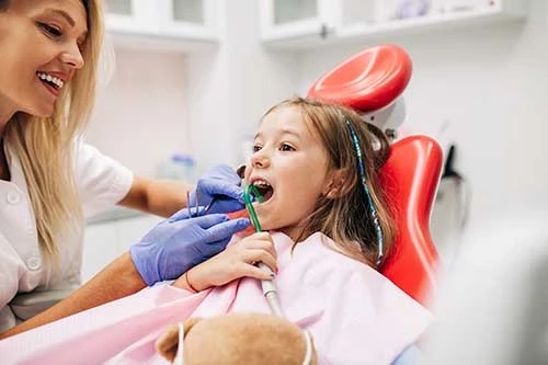 12 Signs Your Child May Need to See a Pediatric Dentist