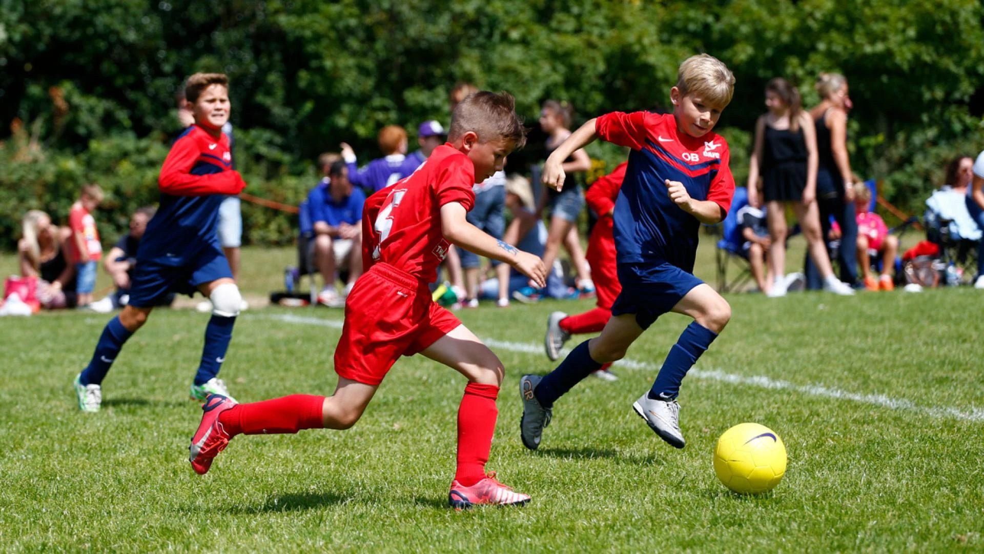 Benefits of Participating in Football Youth Group Games
