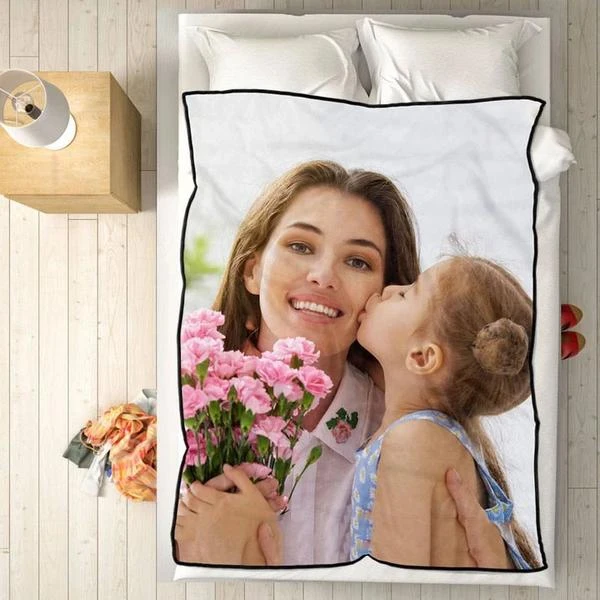 Keep Your Friends and Family Warm and Sweaty With a Custom Photo Blanket