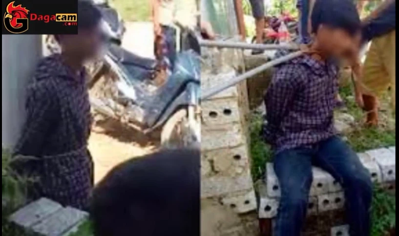 Trộm gà giữa ban ngày, nam thanh niên bị người dân bắt trói vào cột điện