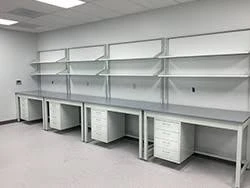 Are there any specific guidelines for grounding an ESD table?