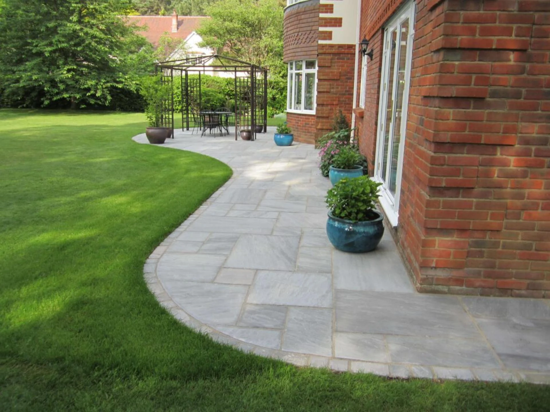 The Timeless Elegance of County Gris Porcelain and Tandur Grey Limestone Paving