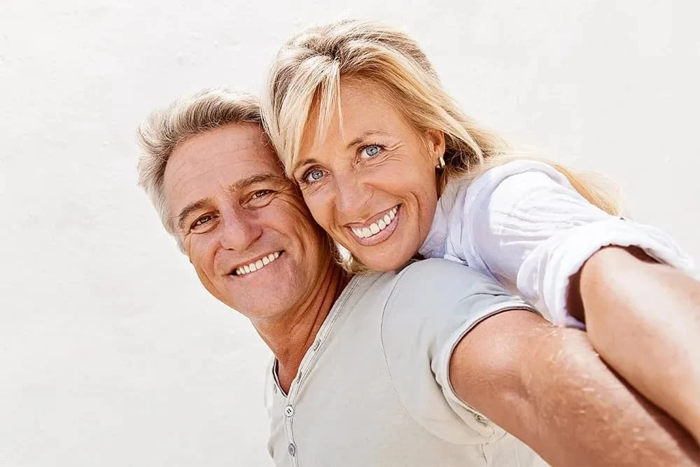 Why More People in Flushing Are Choosing Dental Implants Over Denture