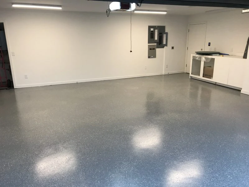 How Epoxy Floor Systems Improve Safety in Garages and Workshops