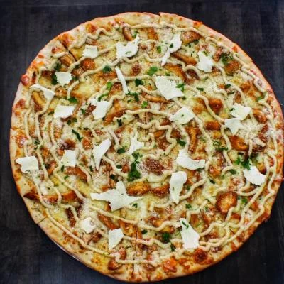 Why Do Foodies Flock to Chicken Pizza Restaurants in New York?
