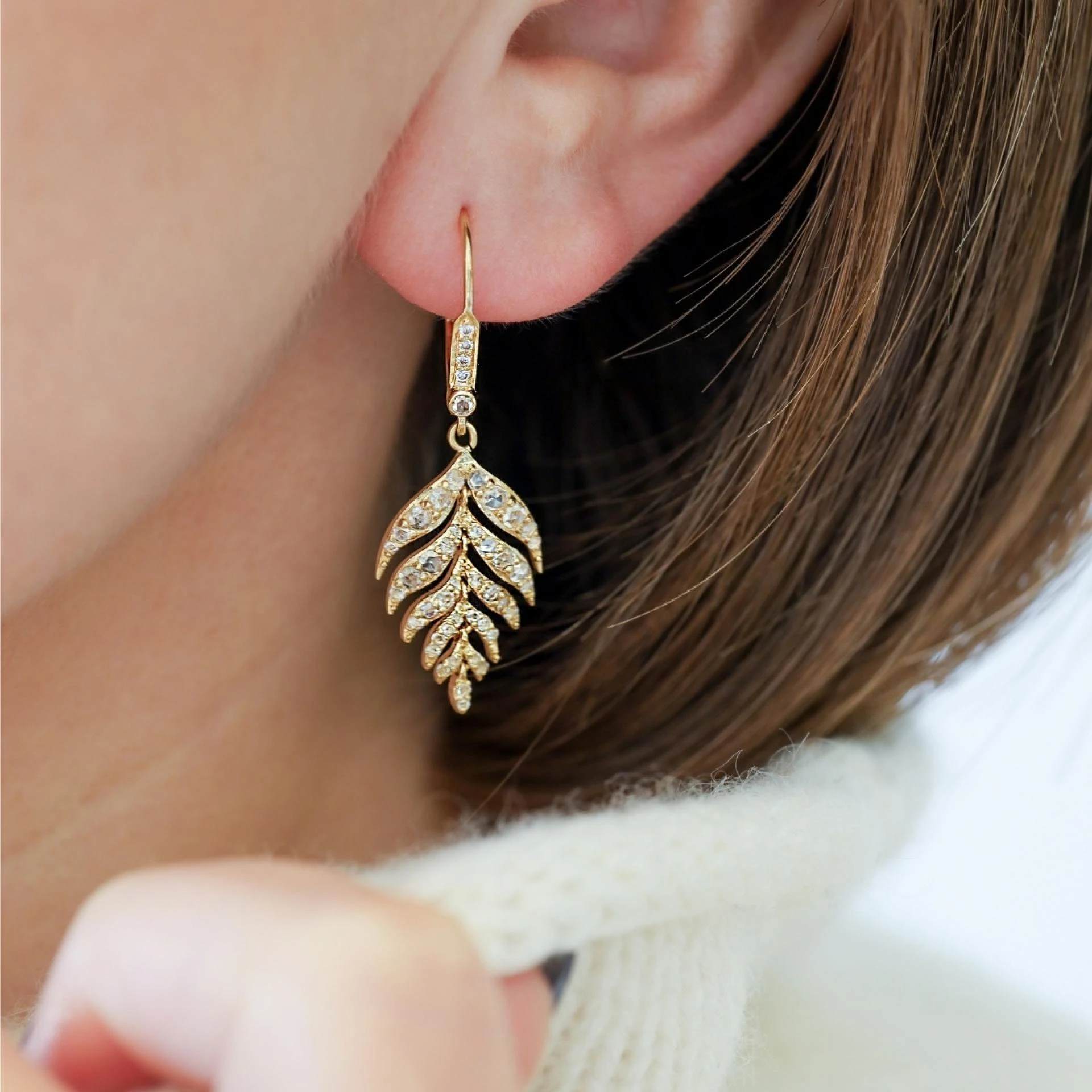 Why a Diamond Engagement Ring and Luxury Earrings Define Elegance