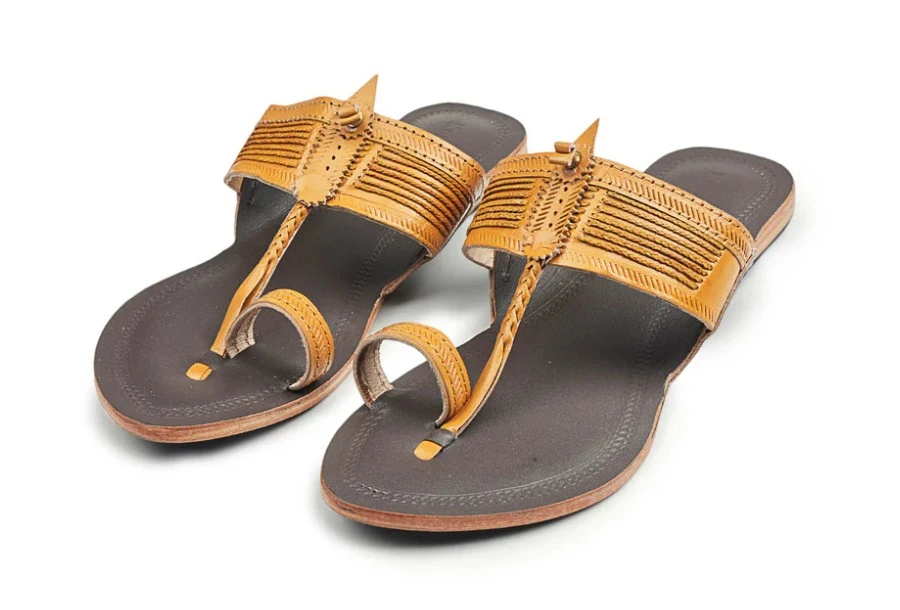 Stepping into Timeless Elegance: The Women In Elegant Dual Kolhapuri Chappal