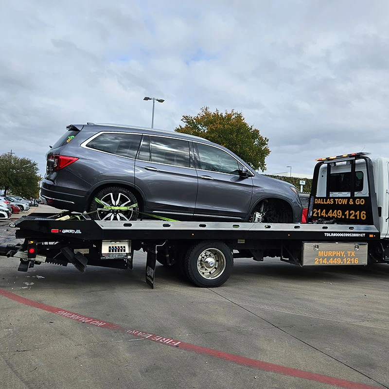 Why Should You Call a Dallas Tow Truck Company Instead of Roadside Assistance?