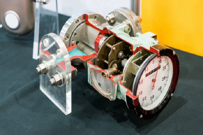 How Does Pressure Drop Occur in an Orifice Plate Flow Meter System?