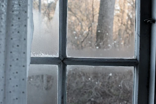 How to stop window condensation during colder months without compromising home warmth?