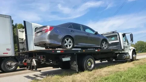 How Flatbed Tow Truck Services Protect Luxury Cars