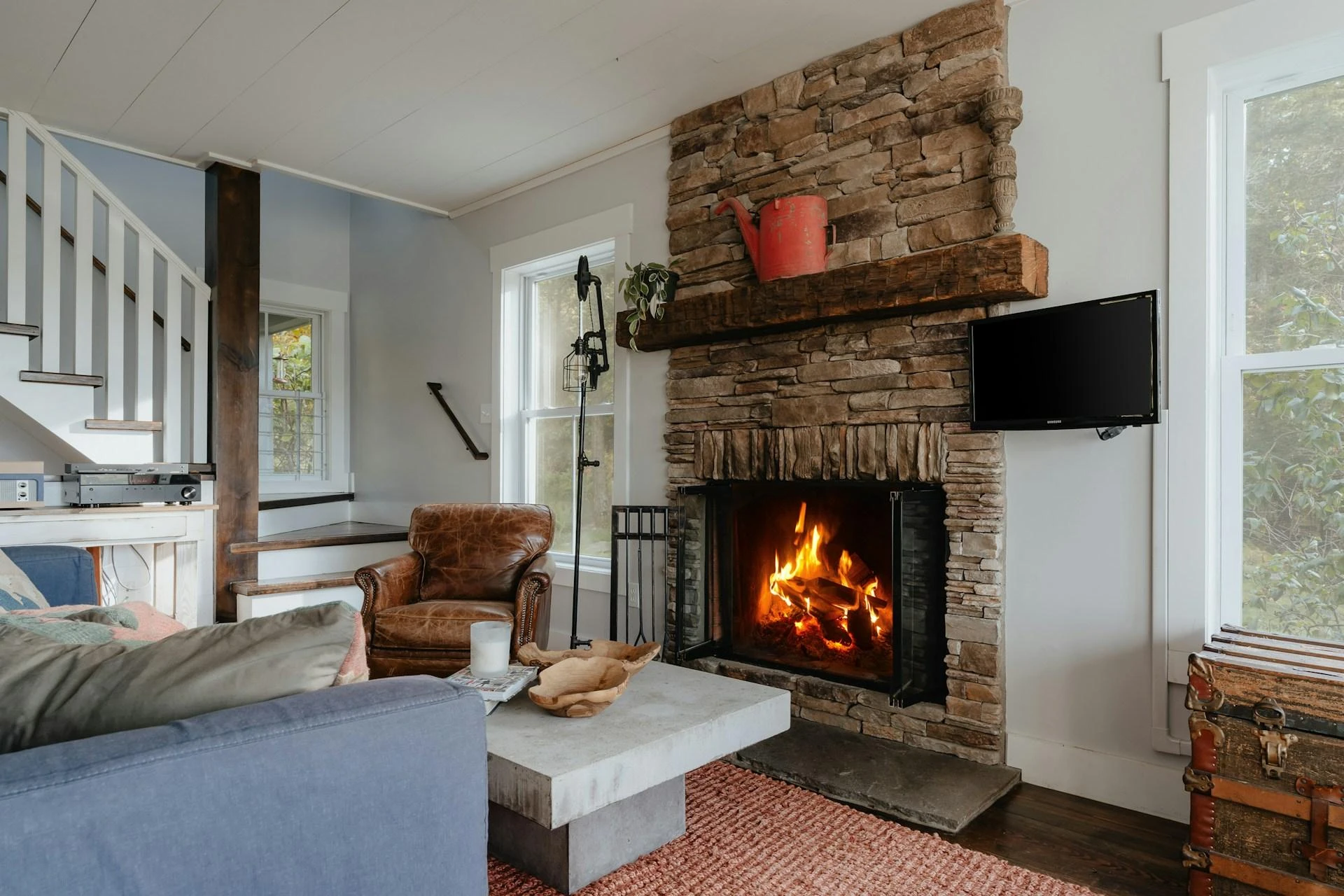 Accent Wall Ideas in a Toronto Home Renovation: Using Dry Stack Stone and Faux Stone Panels Around the Fireplace