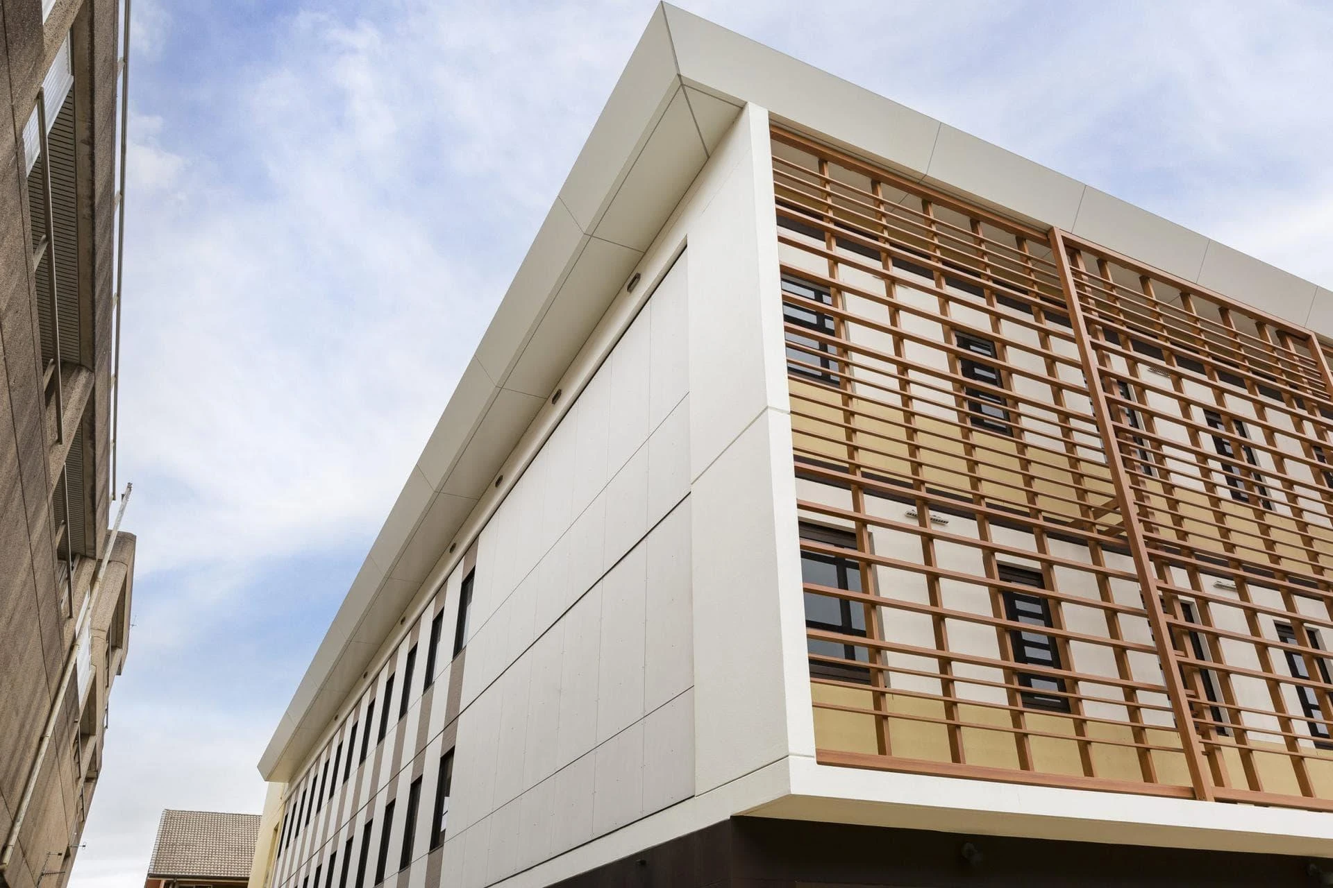 Modernise your building facade and enhance durability with sleek modern cladding.