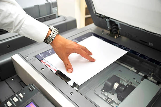 Why Real Estate Agencies Should Invest in High-Speed Photocopiers