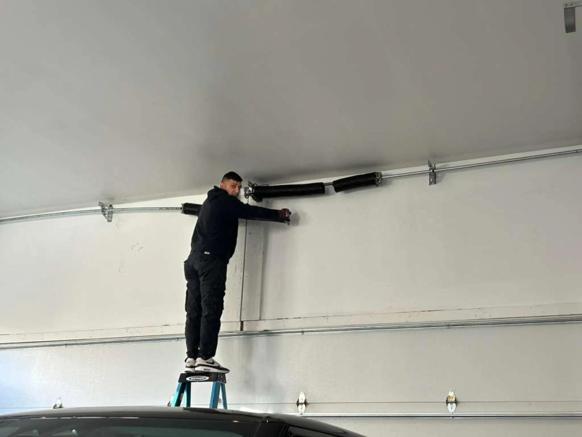 Stuck in the Driveway? Expert Tips on Garage Door Opener Repair in Denver