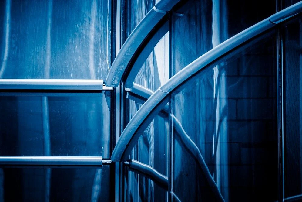 Why Is Curved Toughened Glass Ideal For Modern Glass Facades?