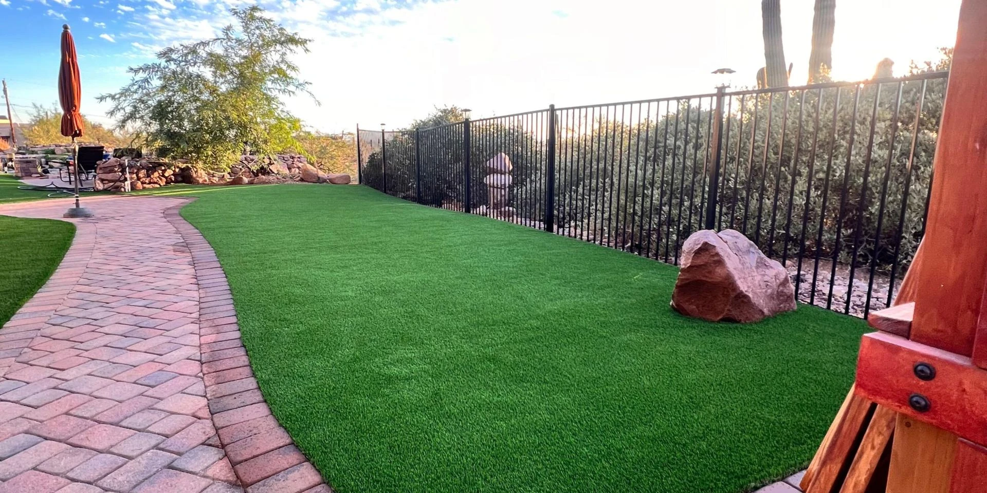 How Artificial Turf Installation Transforms Backyards Into Low-Maintenance Outdoor Spaces?
