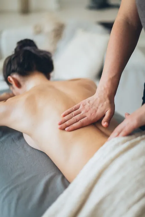a client getting a back massage 