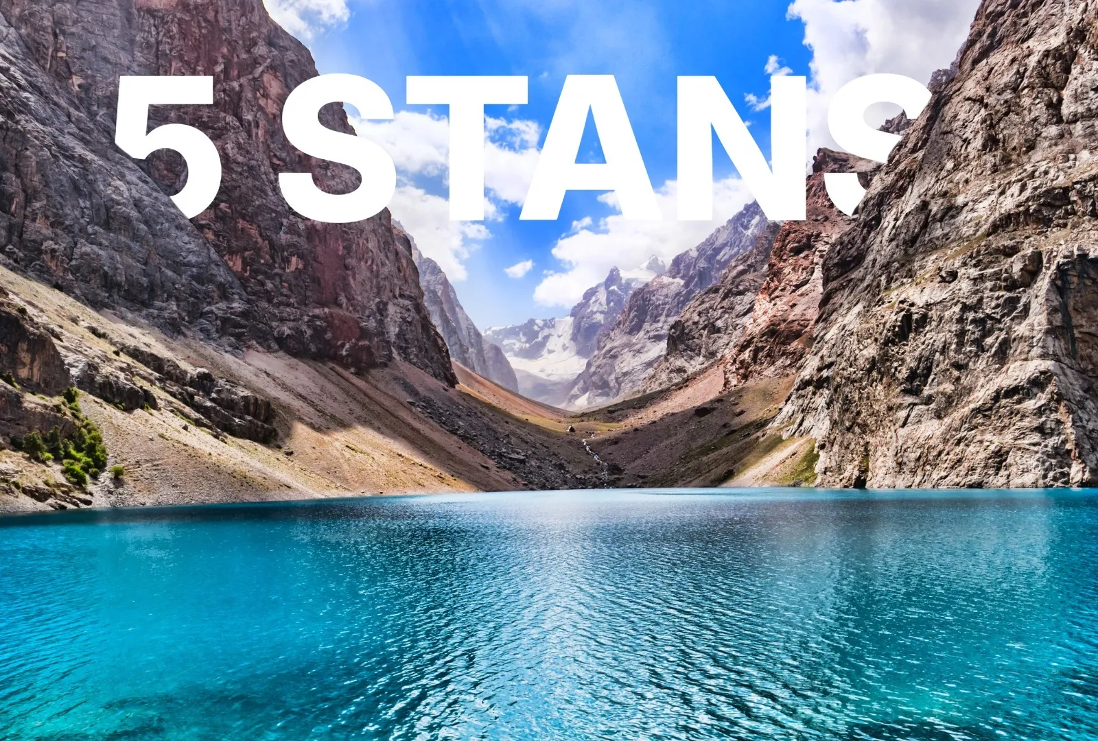 Valley with lake in Tajikistan, a favorite stop on the 5 Stans Tours by East Site, Inc.