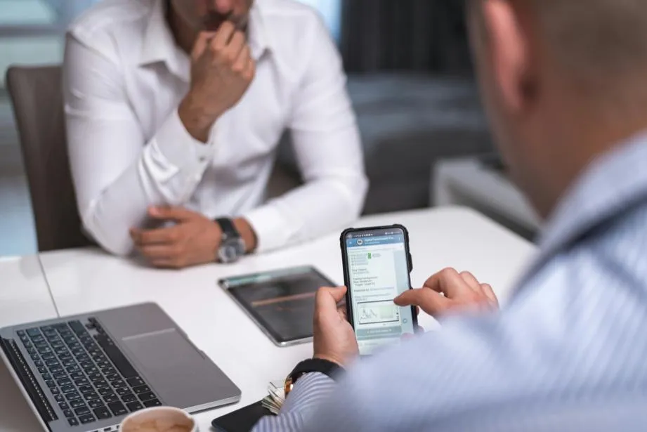forensic specialist extracting data from a smartphone