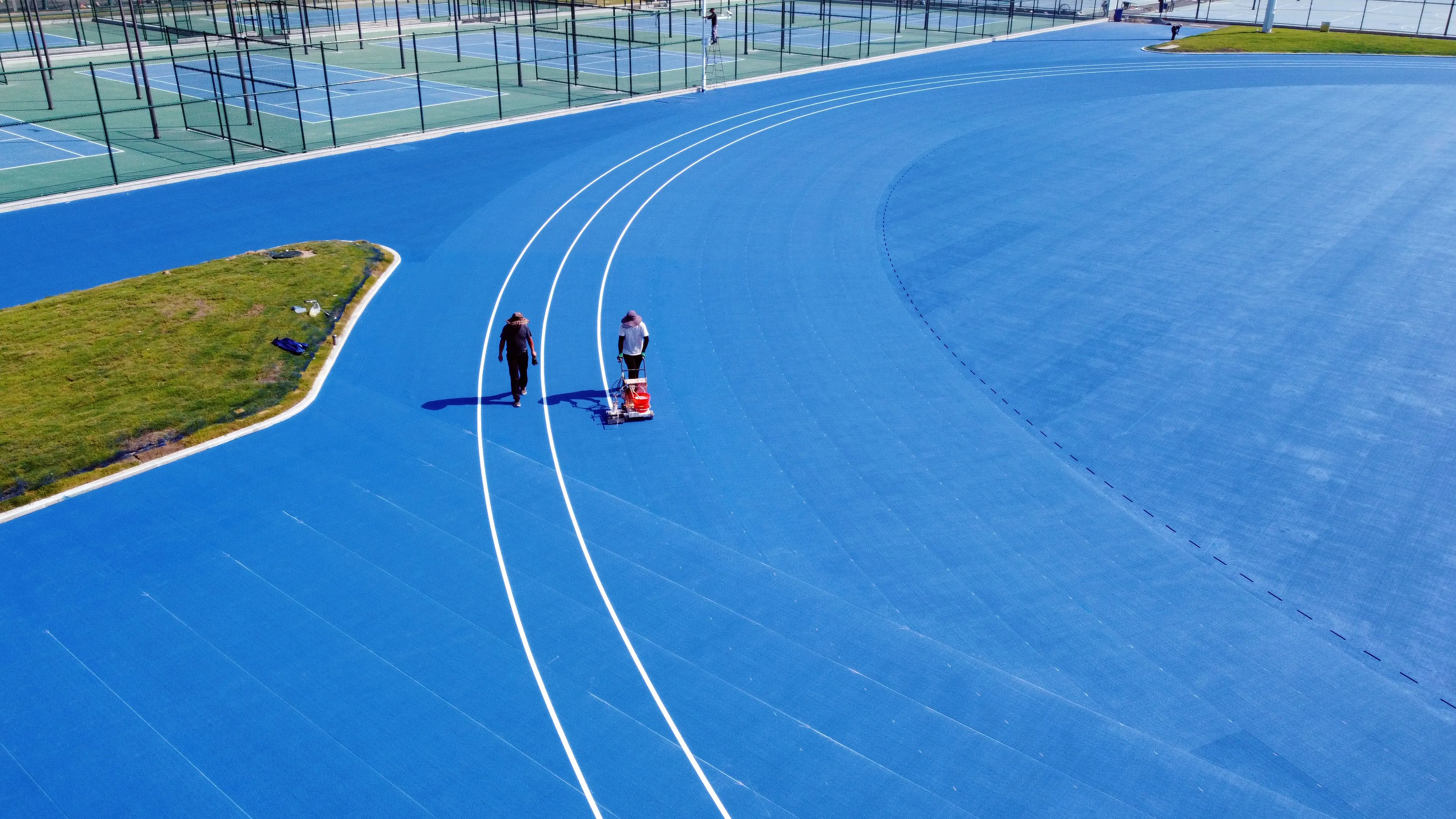 How Long Does a Synthetic Running Track Need to Cure? A Technical Guide