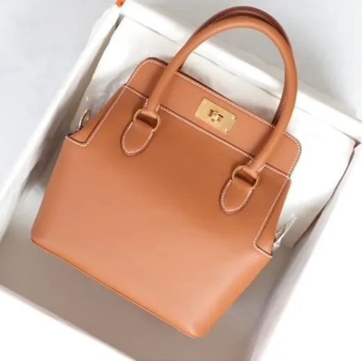 HERMES Tool Box 20 Gold: Compact Luxury with Timeless Appeal