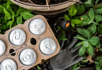 Eco-friendly beverage packaging with sustainable can carrier solutions reducing packaging waste in the beverage industry.