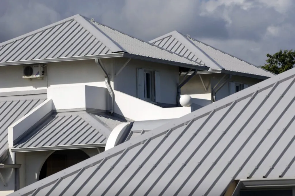 What Hidden Issues Start Beneath a Commercial Roof Surface?