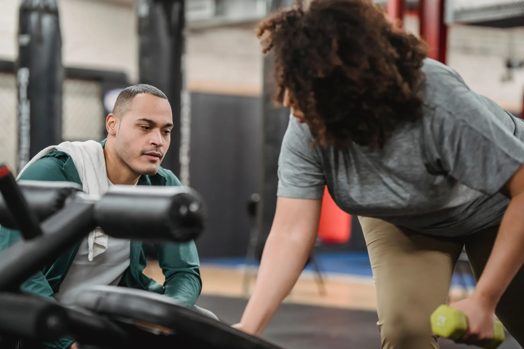 3  Ways a Personal Trainer Pushes You Past the Plateaus You Can't Break Through Alone