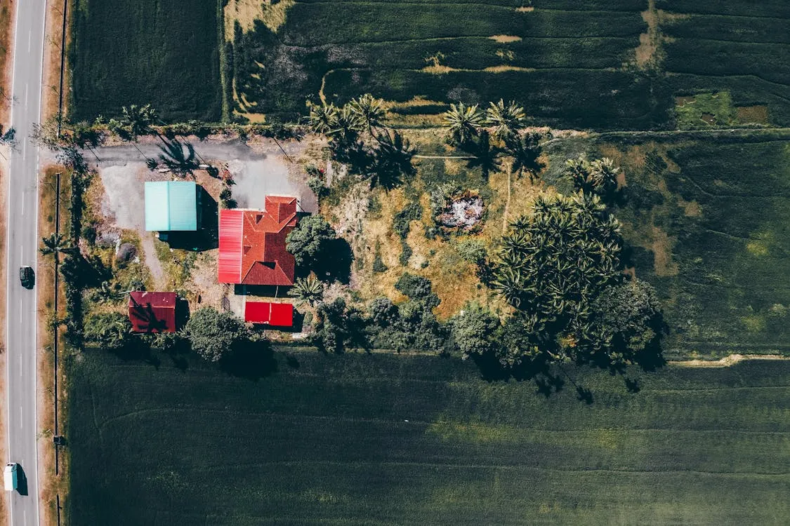 aerial drone photograph of a rural home