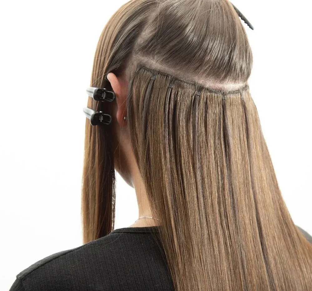 Why Human Hair Tape in Extensions Are Popular in the UK