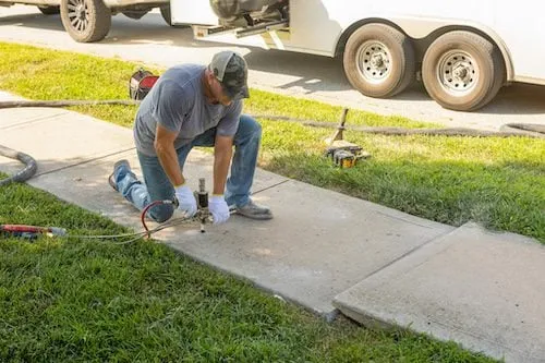 Is Sunken Concrete Ruining Your Driveway and Lowering Your Property Value? Try Driveway Leveling​ near Maple Grove