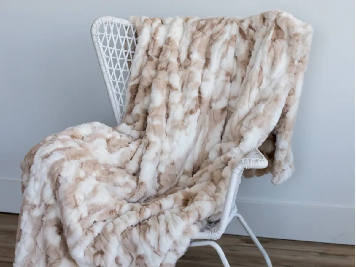 Why Are Couch Throw Blankets Essential for Comfort and Style?