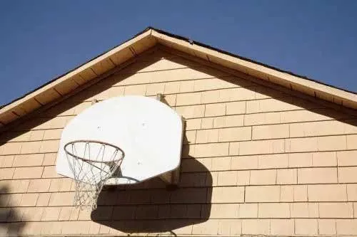 A clean wall-mounted hoop brings the court straight to your home.