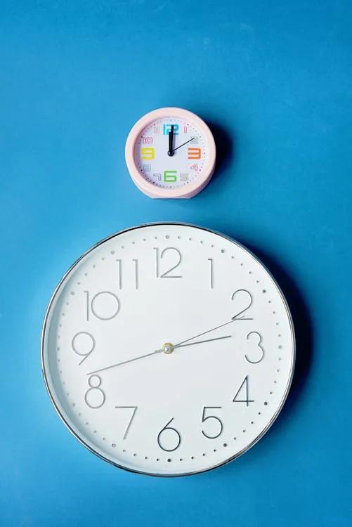 two clocks side by side