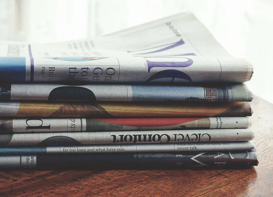 a folded newspaper corner