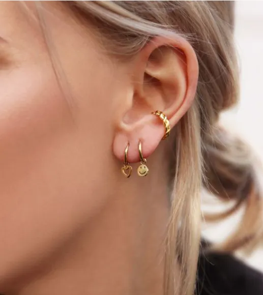 Heavy Earrings Have Stretched Your Piercing? What Women With Enlarged Earlobe Holes Can Do