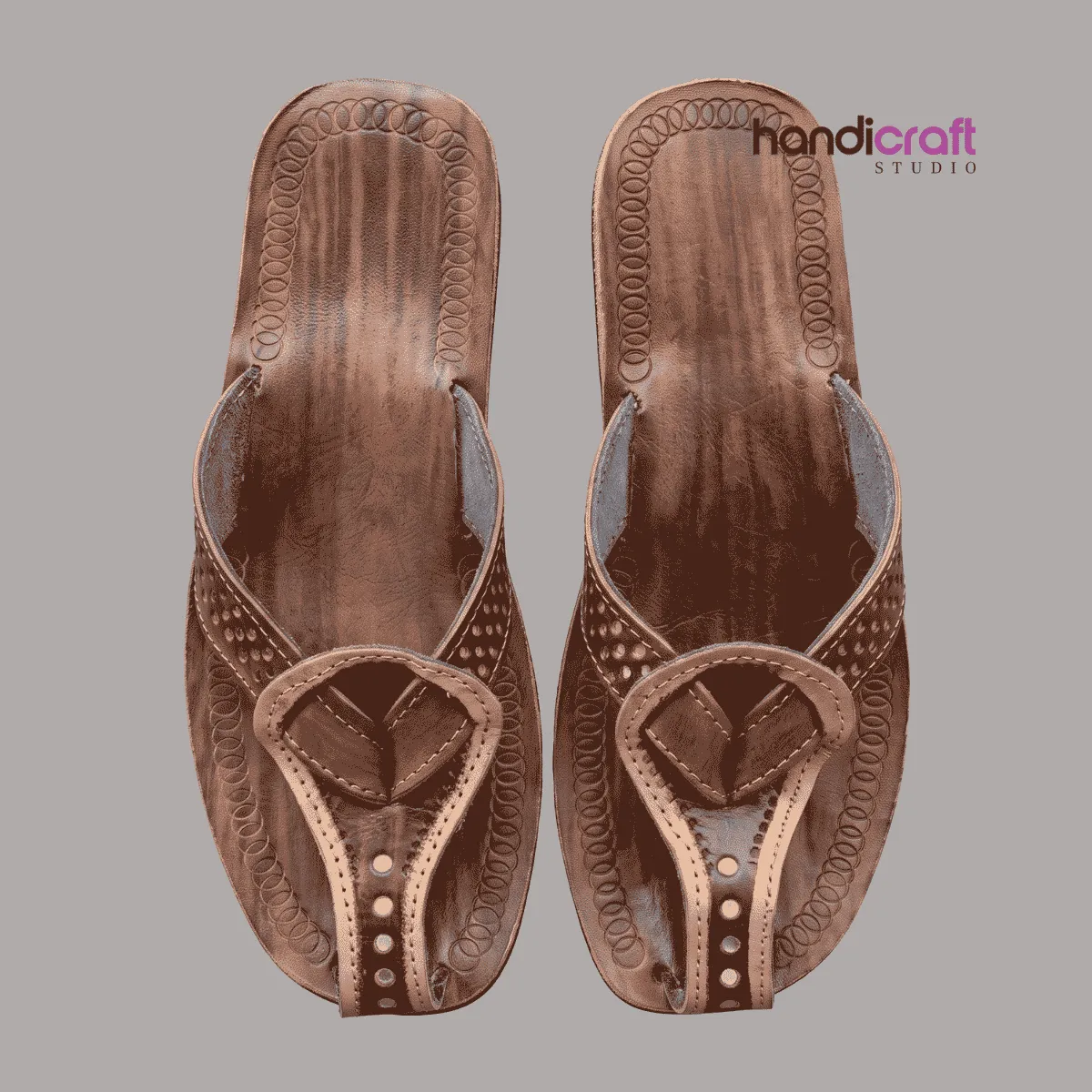 Designer tan brown Himachali leather chappal for women with oval ring motif and detailed edge stitching.