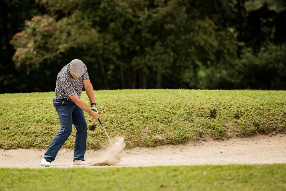 Why Does Bunker Sand Sometimes Feel Firm on Top but Wet Beneath?