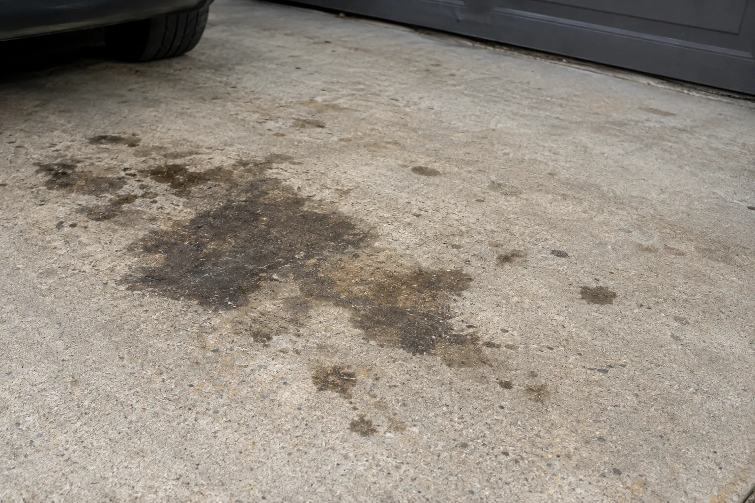 How to Get Oil Stains Off a Driveway (Complete Guide)