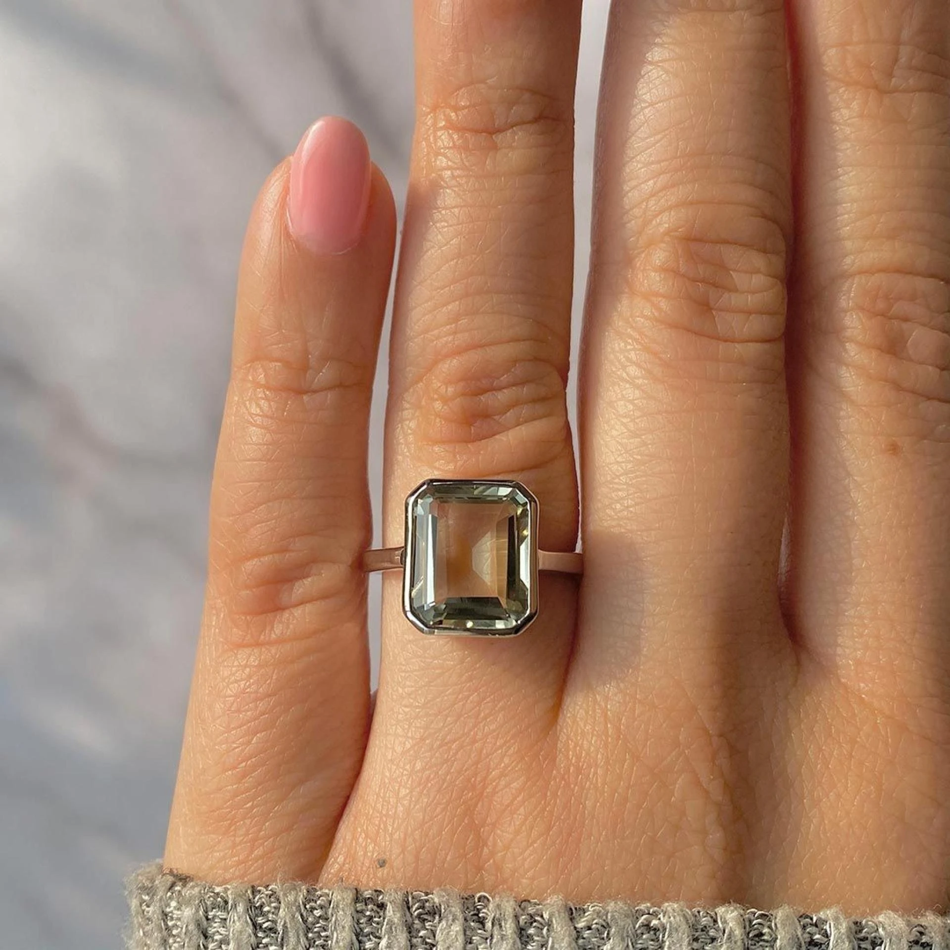 Are there any folktales or old stories associated with enhancements made with green amethyst?