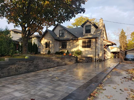 The Art of Functional Beauty: Transforming Your Landscape with Retaining Walls