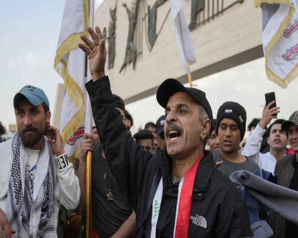 Iraqis protest in Baghdad as currency crisis continues